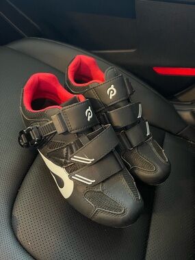 Peloton Black Cycling Shoes with Red Cleats and White Accents